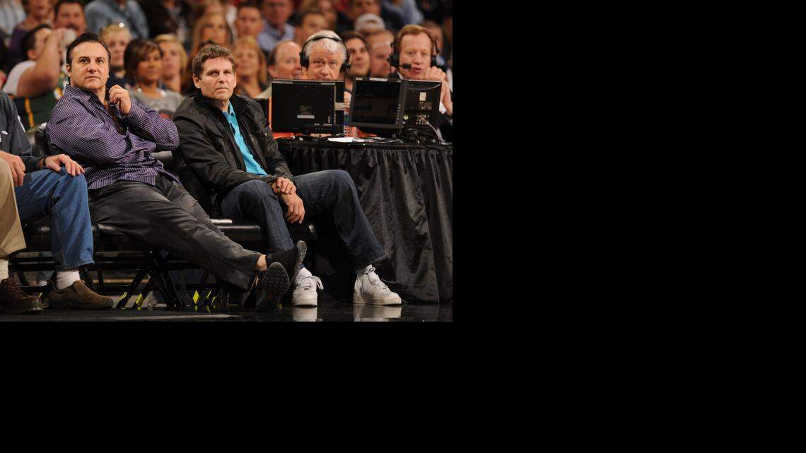 
Gavin and Joe Maloof, then co-owners of the Sacramento Kings, watch their team play the Utah Jazz in 2012 in Sacramento.
