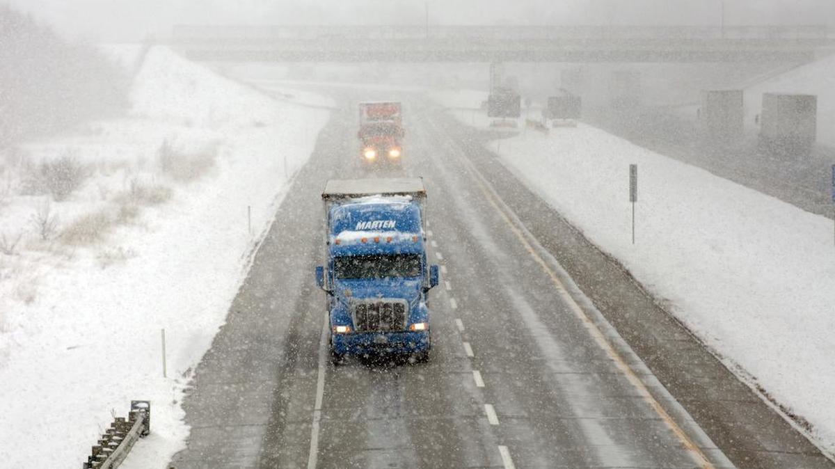 Traffic moves along the Indiana Toll Road in Mishawaka, Ind., during a potent winter storm in 2007.