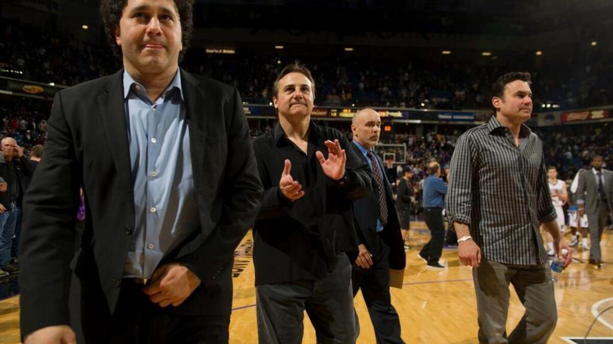 George, Gavin and Phil Maloof leave Sleep Train Arena after a game between the Sacramento Kings and Los Angeles Lakers in 2012. The Maloof family, which sold the Kings in 2013, is getting back into major-league sports by becoming owner of a the NHL franchise in Las Vegas.