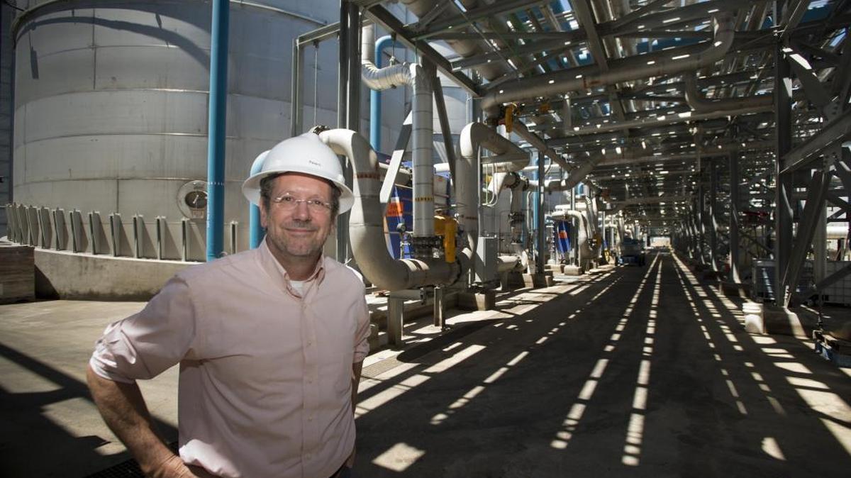 Pacific Ethanol CEO and founder Neil Koehler in front of fermentation tanks and pipes in Stockton in 2014. A CleanStart 2017 Progress Report shows promising numbers for the region.