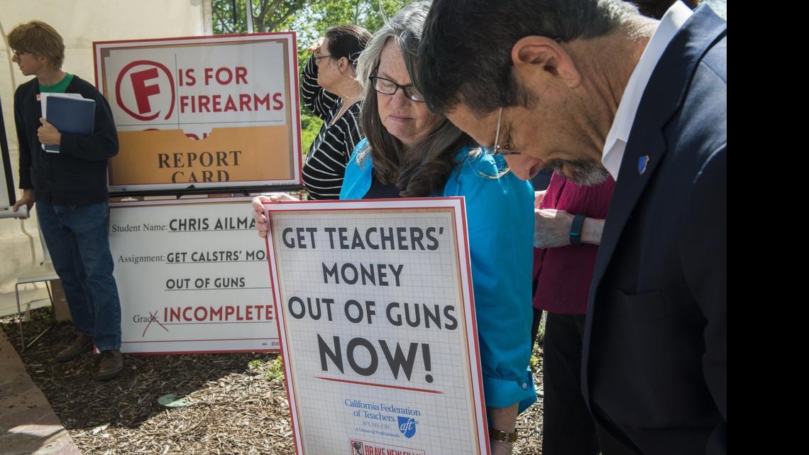 
The California Federation of Teachers stages a protest at CalSTRS headquarters in April, demanding an end to the pension fund’s investments in assault-weapons manufacturer Remington. 
