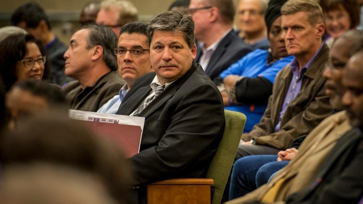 Paul Petrovich waits to speak Tuesday to the City Council about his plan to build a gas station in Curtis Park Village.