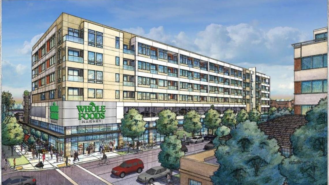 An architectural rendition shows the Whole Foods project near 21st and L streets. It will include 97 apartments.