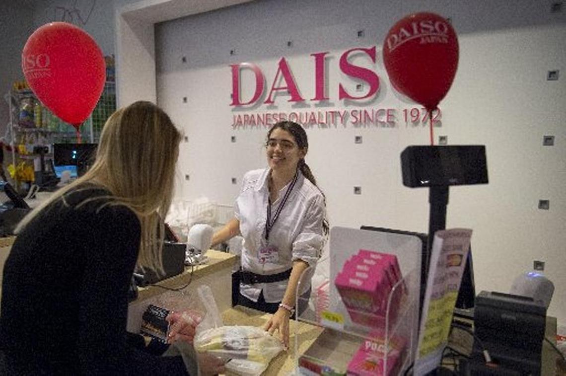 Sabrina Sarai checks out a customer at Daiso Japan, the worldwide Japanese dollar shop, on Tuesday, March 8, 2016, at the Westfield Galleria Mall in Roseville.