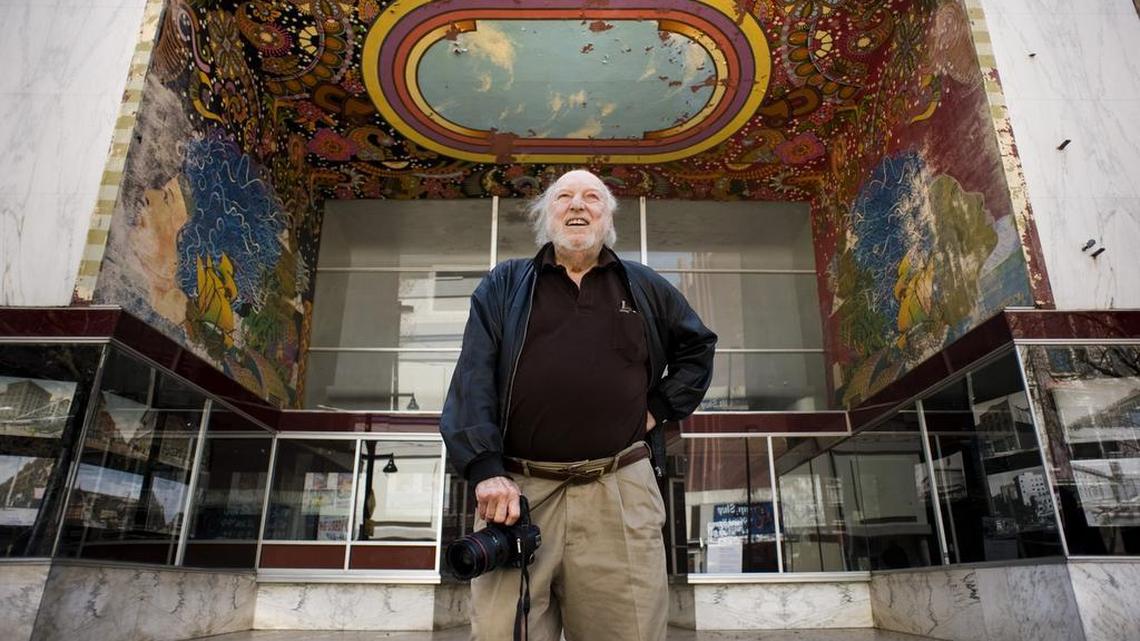 Tower Records founder, Russ Solomon, photographs a mural that was painted in 1973 on what was once a small outlet store that he owned on K Street.