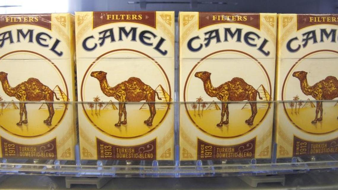 In this photo April 20, 2011, file photo, Camel brand filters cigarettes from Reynolds American Inc., are displayed at a tobacco product store in Cranberry, Pa.