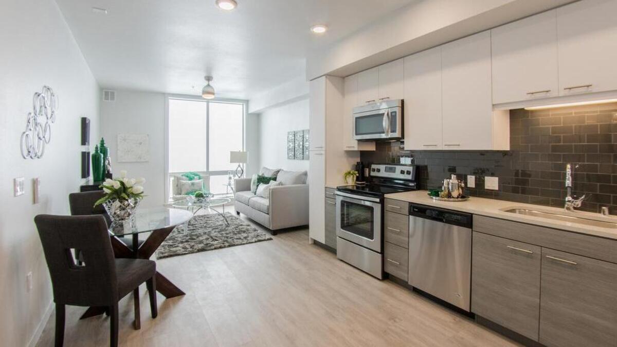 
Units for the new Eviva Midtown apartment complex, like this furnished prototype, are being constructed offsite as complete living spaces, with cabinets, flooring, appliances and all fixtures included.
