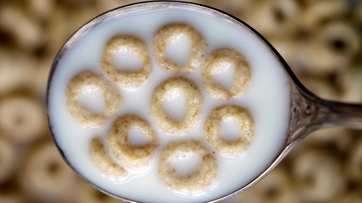 
This June 15, 2011 file photo shows a spoonful of Honey Nut Cheerios in Pembroke, N.Y. General Mills on Monday, Oct. 5, 2015 said it is recalling 1.8 million boxes of Cheerios and Honey Nut Cheerios produced at a plant in Lodi, Calif., saying the cereal is labeled gluten-free but actually contains wheat. 

