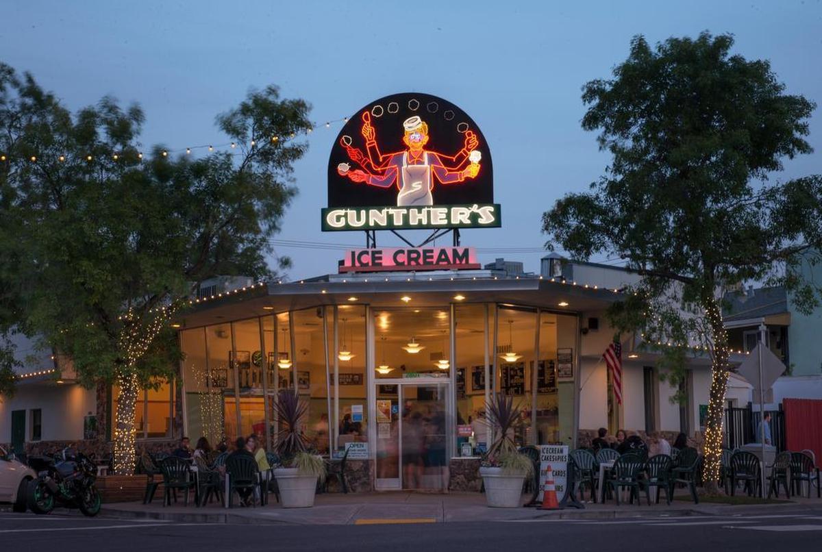 Gunther’s neon “Jugglin’ Joe” sign was designed by the ice cream shop’s original owner Herman Gunther, who told his children that if Joe ever dropped a tossed scoop, that day’s ice cream was free.