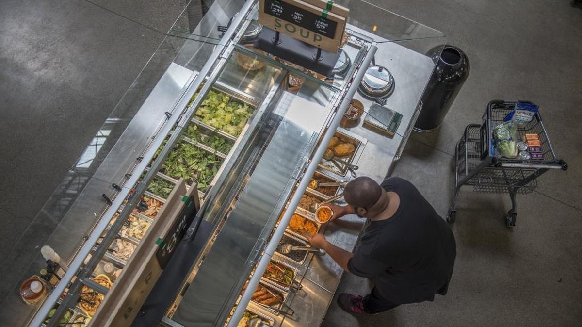 The salad bar at Raley's Supermarket offers organic vegetables and centers on the theme of the store a pathway to a healthier community on July 17, 2017, in Sacramento.