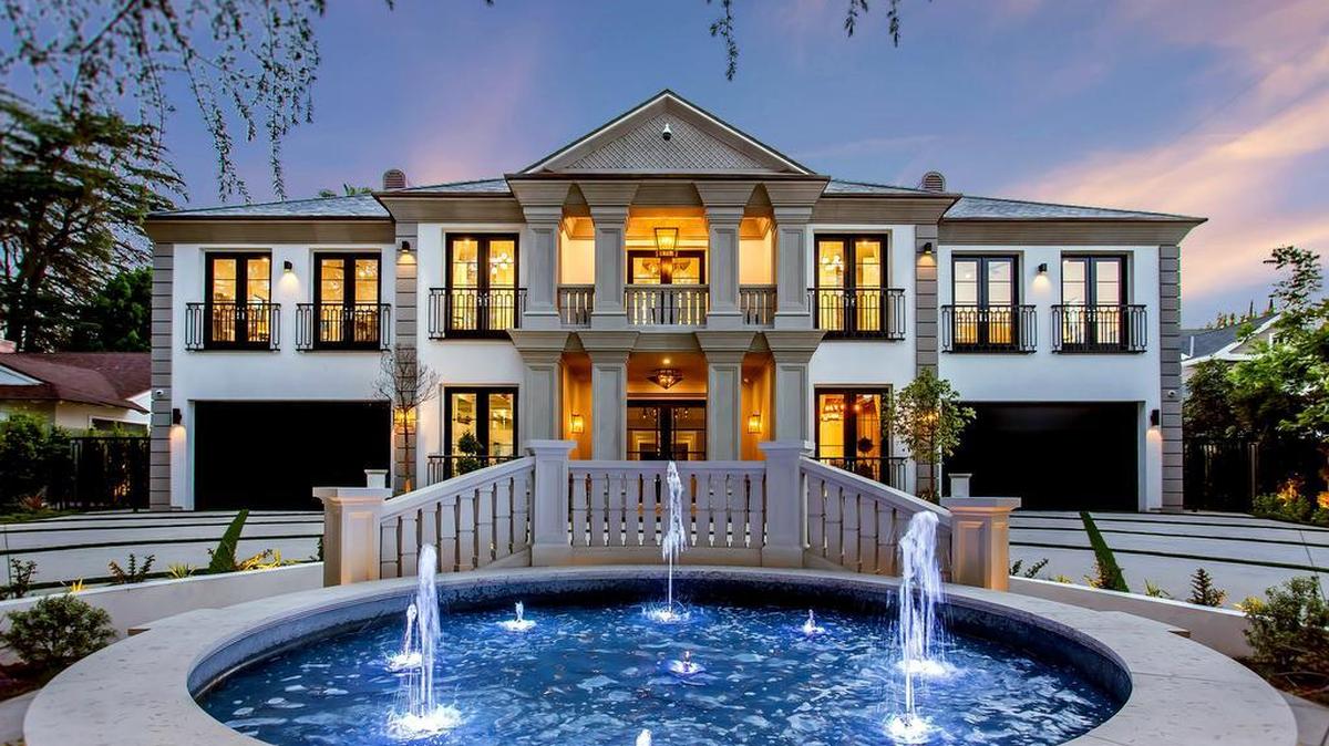 Homes like this 14,900-square-foot luxury home in Encino will be subject to a new “mansion tax” when they are sold.