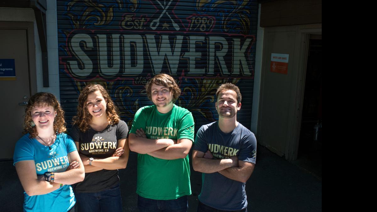 UC Davis students Evann Dufort , Abby Kanyer, Brandon Rotondo and Jeff Damilano, from left,   earned more than good grades with their concoction. Their beer, Class is in Session IPA, will be produced at Sudwerk Brewing Co. and will be sold at local venues.