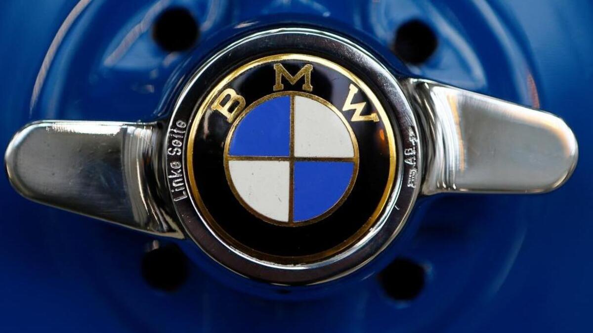 FILE - This March 7, 2016 file photo shows the logo of German car manufacturer BMW in Munich, Germany. BMW is recalling more than 1 million cars and SUVs due to a fire risk, and recommends parking them outside in the meantime.