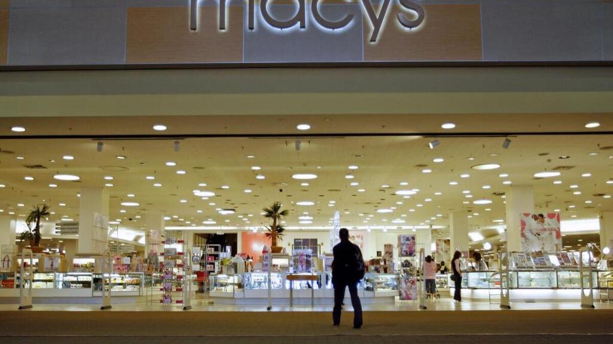 A single shopper is seen at the Macy’s Citi Plaza store in downtown Los Angeles on Friday, Jan. 30, 2009.