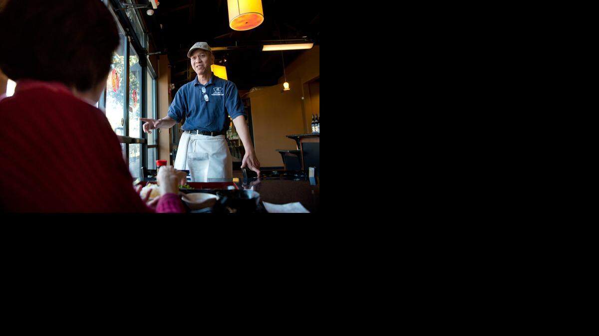 
Owner Sai Wong chats with a customer at his recently opened Izakaya Daikoku restaurant at 19th and S streets. The resurgent economy in California and Sacramento has produced a rush of new restaurant openings, accompanied by hiring of restaurant staff. 
