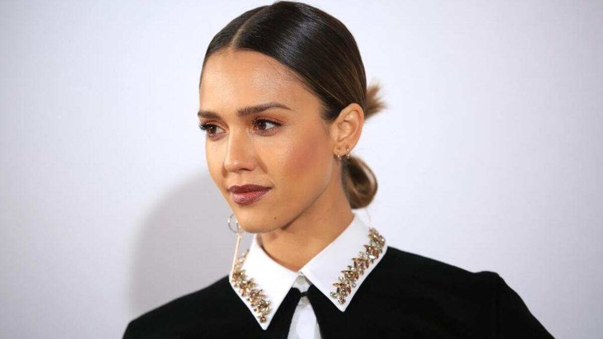 U.S actress Jessica Alba poses before the presentation of Christian Dior's fall-winter 2016-2017 ready to wear fashion collection presented, Friday, March 4, 2016 in Paris.