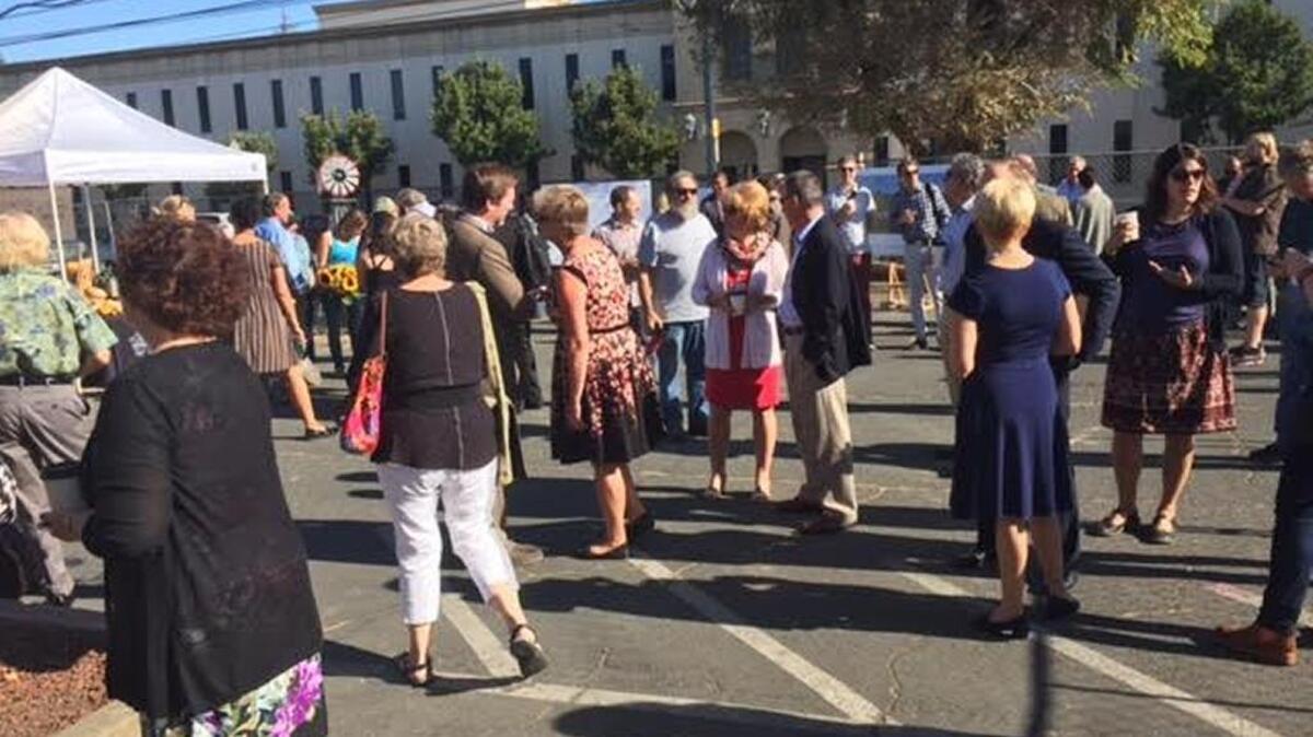 
A crowd gathers at groundbreaking of new Sacramento Natural Foods Co-op.
