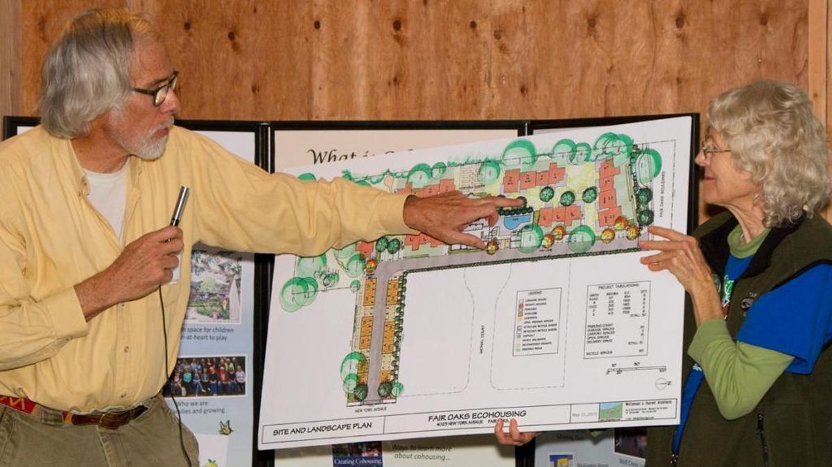 Architect Chuck Durrett, left, describes the amenities of Fair Oaks Eco-Housing, a cohousing community that recently broke ground along Fair Oaks Boulevard. Cohousing allows community members to buy individual units within a village-like community. Marty Maskall has been working to make the project a reality for more than a decade.