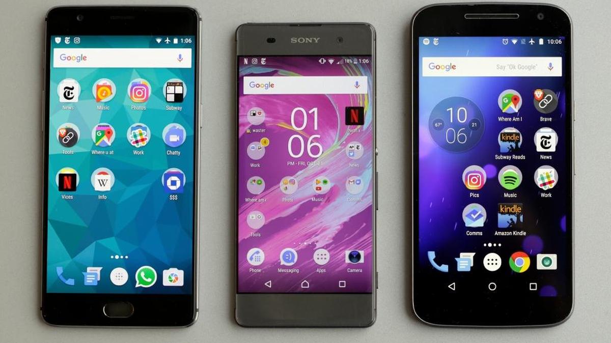 Phones which run on the Android Operating System are seen. A man frustrated with cellphone communication with his son has created an app that forces recipients to respond before they can resume other activity on their devices.