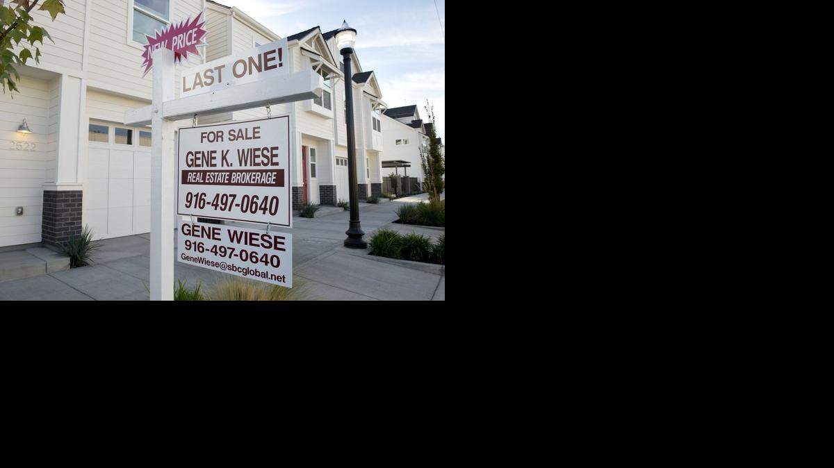 
A For Sale sign lists the last home available at a development near 25th and R streets on Tuesday, Oct. 7, 2014 in Sacramento, Calif.

