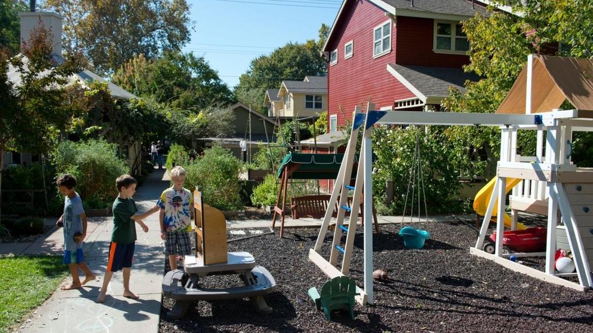 Children play in the common area at Southside Co-Housing Community on Oct. 13, 2013, in Sacramento.