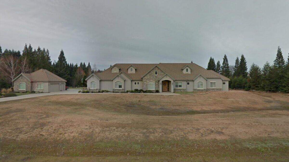 House on 9800 block of Pine Acre Court
