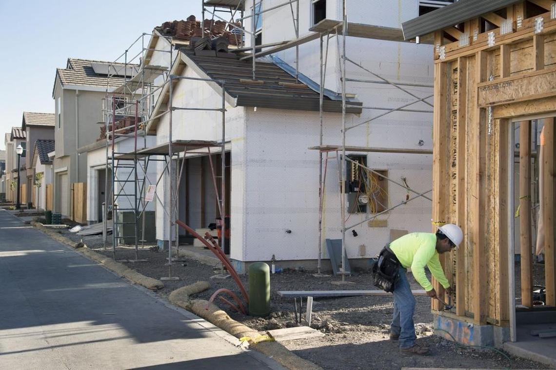 A row of new homes are nearing completion in North Natomas on Thursday, July 13, 2017 in Sacramento, Calif. There is not much new home construction in Sacramento compared to past recovery cycles. One of the few areas of large-scale construction is in North Natomas where the three home types currently in high-demand are being built: 55+ one-story homes, small starter homes, larger move-up homes.