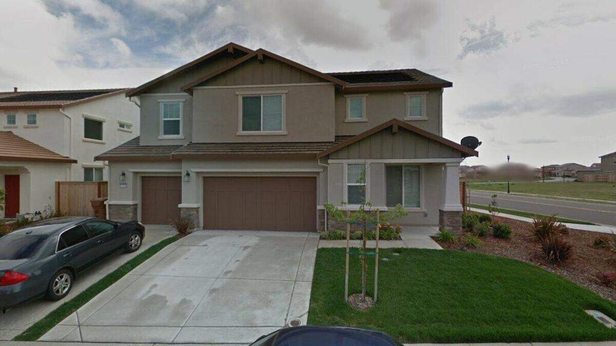 House on 9700 block of Collie Way
