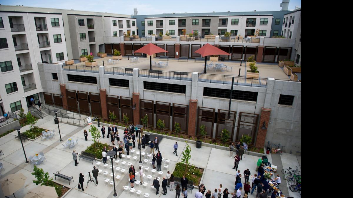 
Residents and officials celebrate the grand opening of the Cannery Place Apartments on Monday in Township Nine in the River District of Sacramento. 
