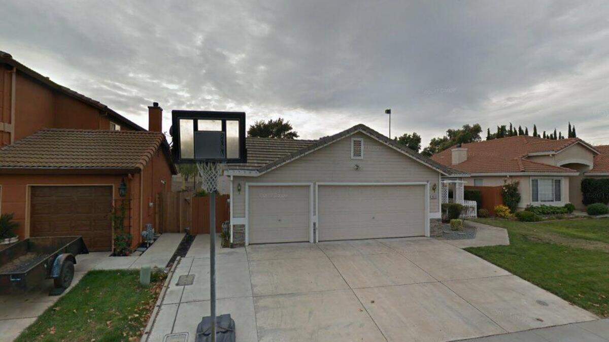 House on 5700 block of Beach River Place