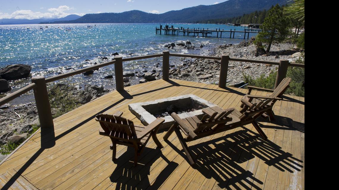 
The view from a deck at an $8.8 million home for sale near the shore of Lake Tahoe is seen during a lakefront luxury home tour. Wednesday, June 26, 2013.
