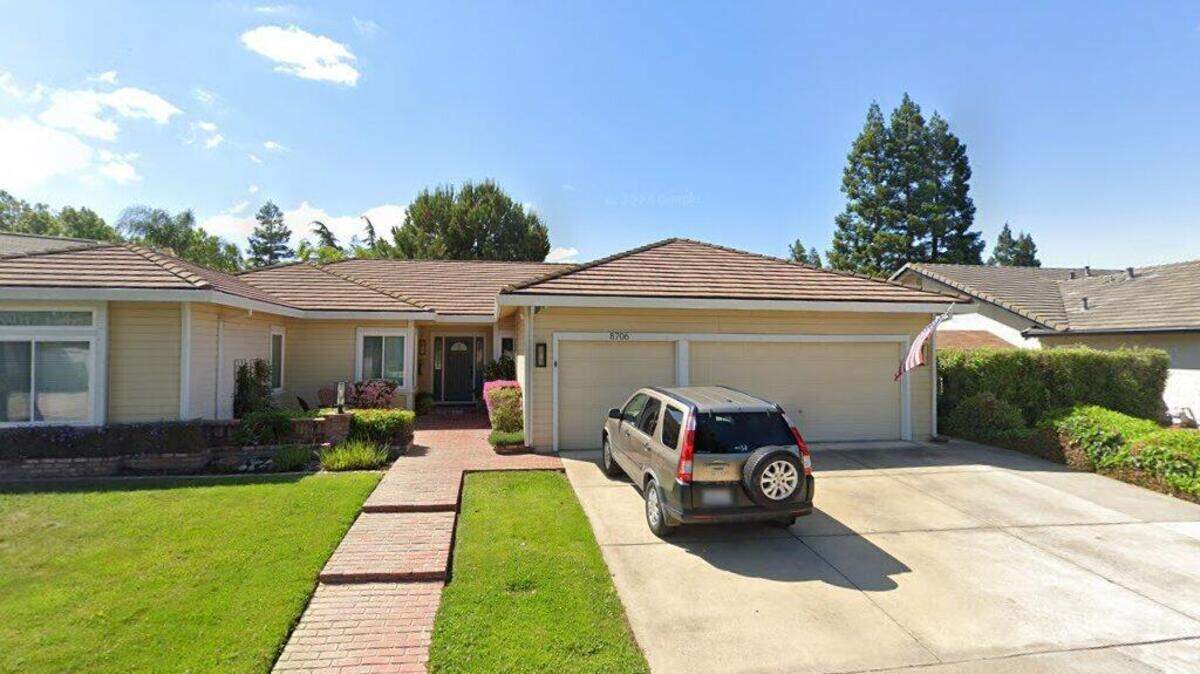 House on 8700 block of Players Court