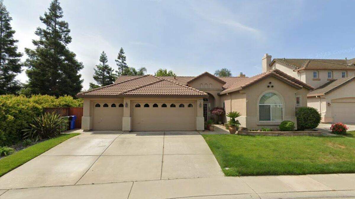 House on 9400 block of Winding River Way