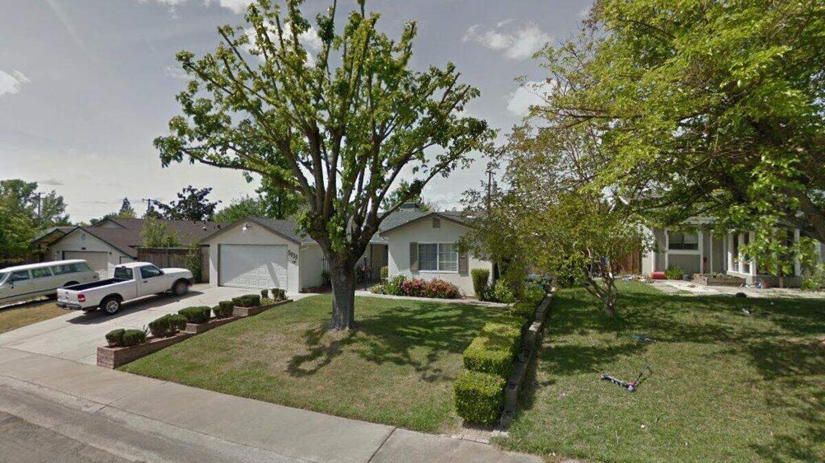 House on 7000 block of Woodknoll Way