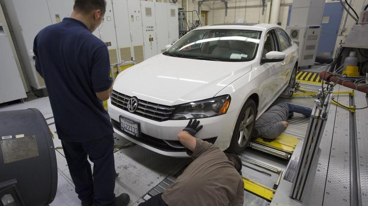 Technicians test a 2013 Volkswagen at the California Resources Board’s lab in El Monte. Volkswagen is paying billions to settle claims over tainted diesel vehicles in California and elsewhere.