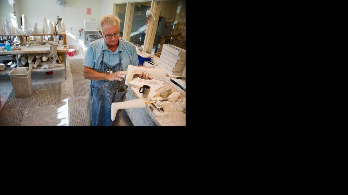 
Orthotist Greg Aaron works on a plaster mold of a patient’s lower leg and foot while making a corrective brace in the orthotics and prosthetics lab at Shriners Hospitals for Children Northern California in Sacramento on Tuesday.

