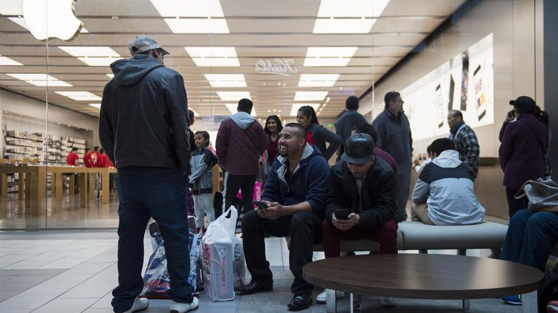 Black Friday shoppers at Arden Fair mall in Sacramento. California sales tax rates will fall New Year’s Day.