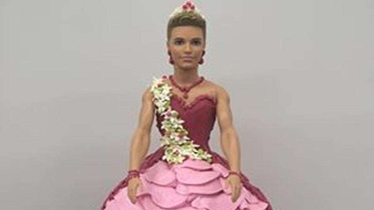 A Ken doll is dressed in pink butter cream for a cake made by Sacramento’s Freeport Bakery