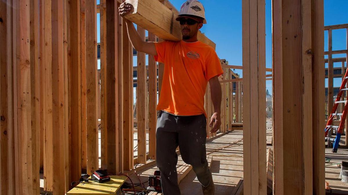 Construction crews work on the new Hampton Inn on 65th Street near U.S. Highway 50 in Sacramento last week. The capital region’s construction industry began its seasonal cutback in October by eliminating 3,100 jobs.