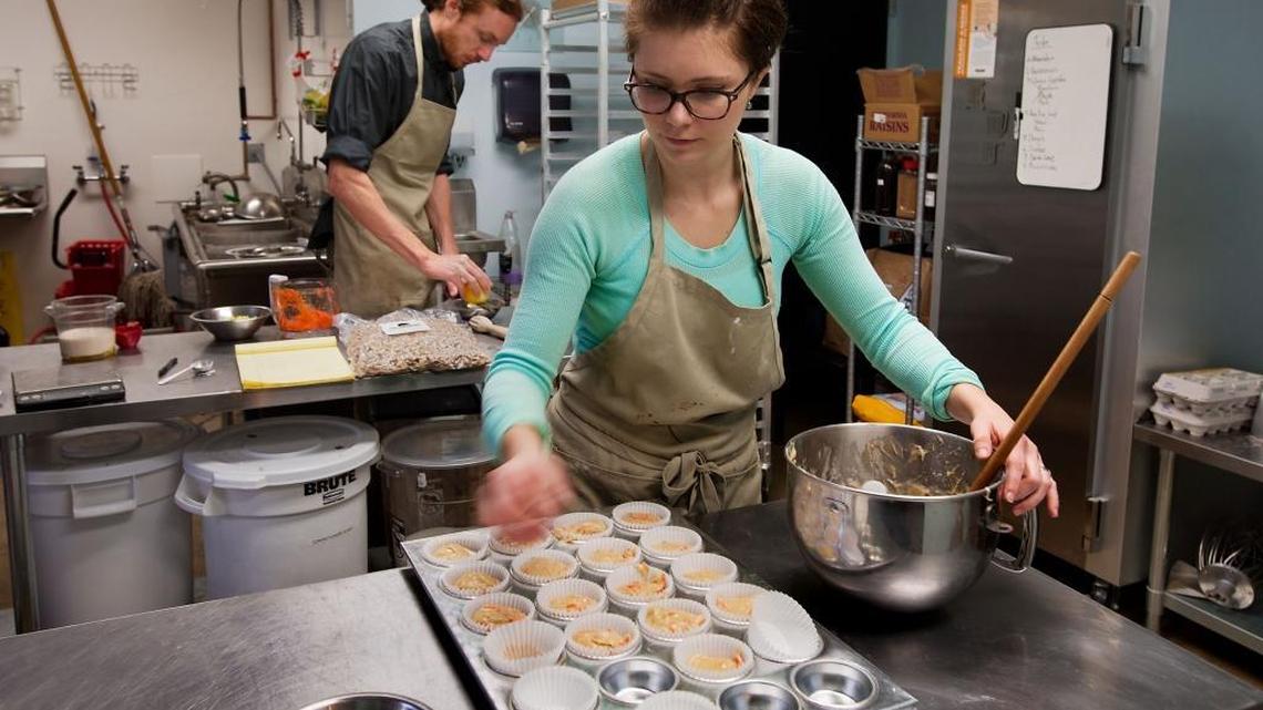 Danny Turner, left, and his wife Olga Turner bake at Pushkin's Bakery in Sacramento. The couple are planning to move to a much larger location next year.