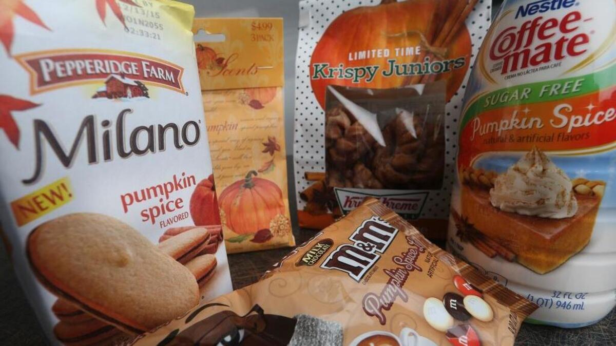 An assortment of treats flavored with pumpkin spice are seen. CVS is introducing a cough drop with the flavor.
