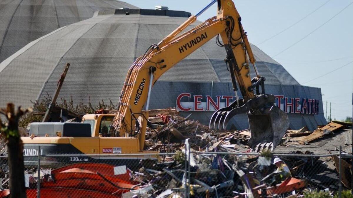 Workers demolish a dome at Century Theaters on Ethan and Arden Way in Sacramento on June 3, 2015.