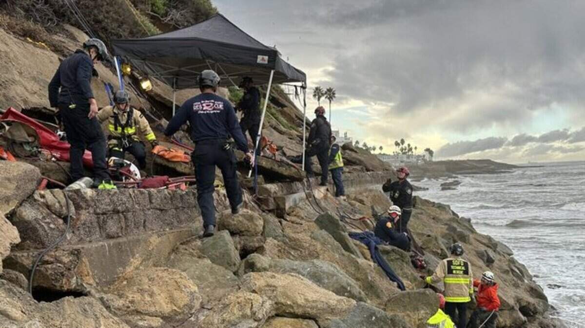A man was rescued after getting stuck in a hole on the side of a cliff, California firefighters said.