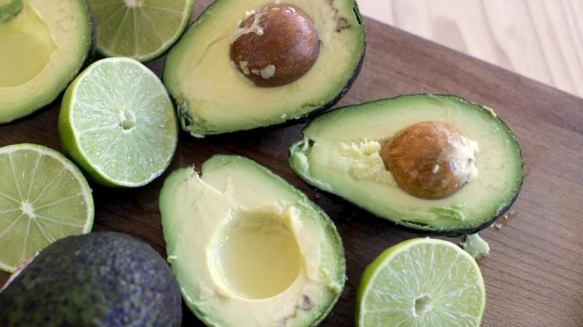 FILE - This Dec. 15, 2014 photo shows avocados and limes