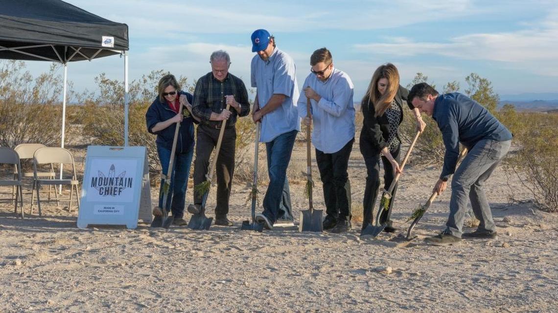 Former Kings center Brad Miller (third from left) breaks ground at the site of his future marijuana manufacturing plant in California City.