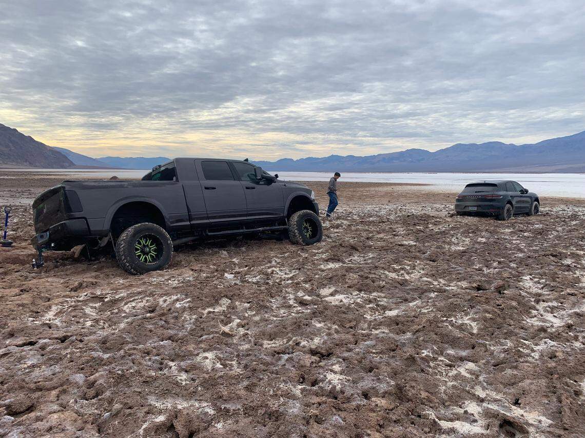 A Porsche SUV became stuck in the mud in Death Valley National Park after illegally off-roading, rangers said.