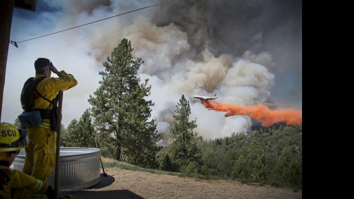 
 Firefighting officials halted aerial drops when drones were spotted, fearing a deadly collision with small craft.
