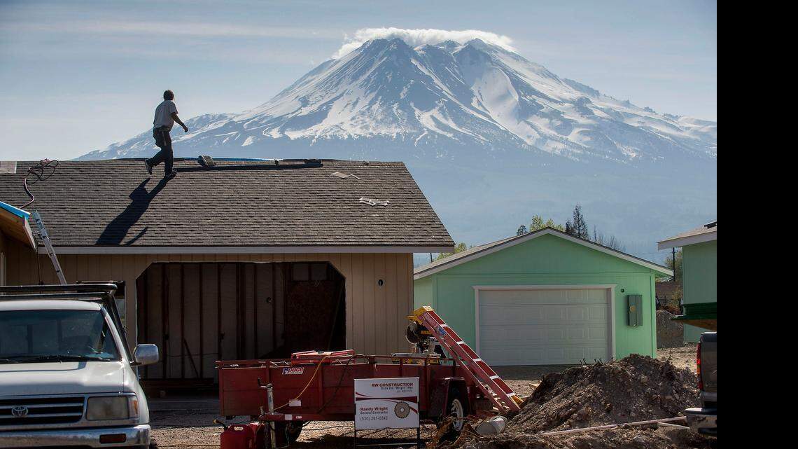 
Construction progresses in Weed on Tuesday, April 21, 2015, on homes in the neighborhood worst affected by the Boles fire, which devastated the town in September.
