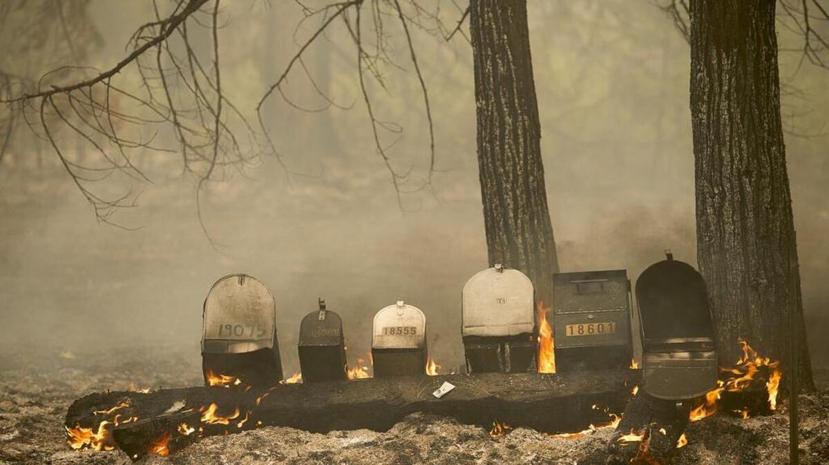 
Mailboxes burn during the Butte fire on Jesus Maria Road and Ponteroff Road on Saturday September 12, 2015 in Calaveras County , Calif. 
