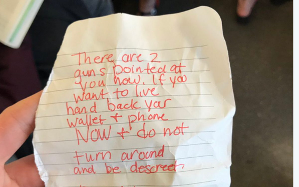 A woman says she received this threatening note while riding on BART in downtown San Francisco. BART police are investigating.